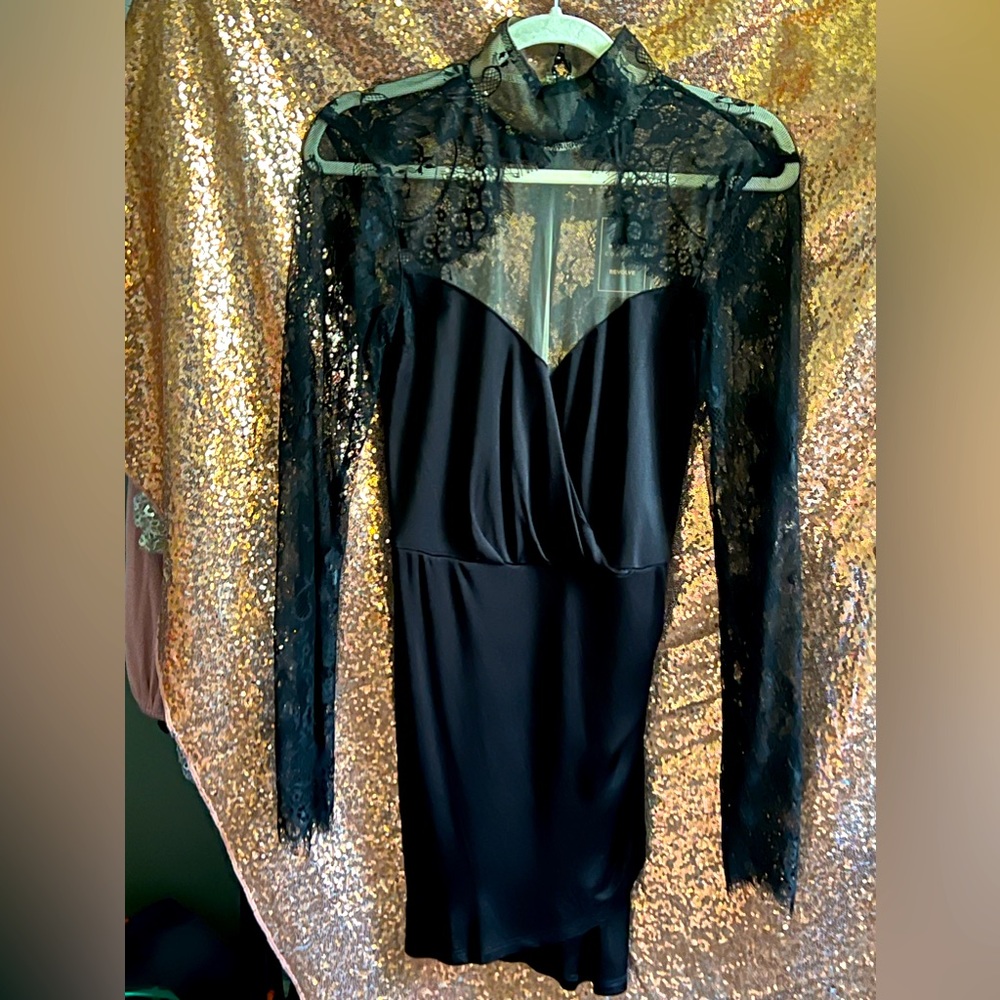 Black mini dress with button up lace neck by Michael Costello for Revolve